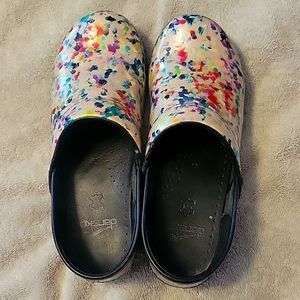Dansko patent leather clogs